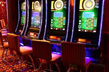 Microgaming slot game interface showing reels, paylines, and bonus features